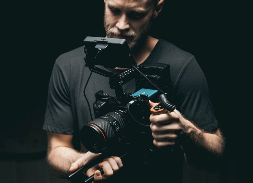 a man with a camera in his hand